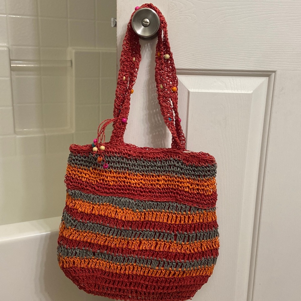 Cute red and orange shoulder bag.